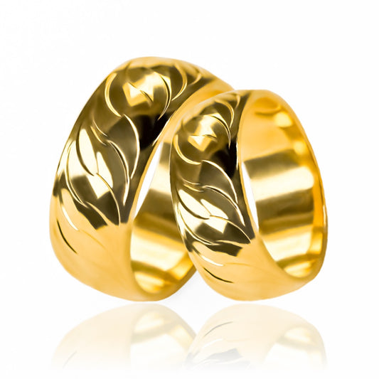 Argollas de Matrimonio Shine Esse, elaboradas en oro 18 quilates por Joyería Caracas, cada anillo viene con un certificado de calidad y garantía para toda la vida.