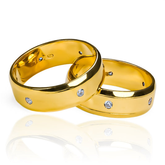 Argollas de matrimonio Shine Six, elaborados en oro 18 quilates por Joyería Caracas, cada una viene con un certificado de calidad y una garantía de por vida.