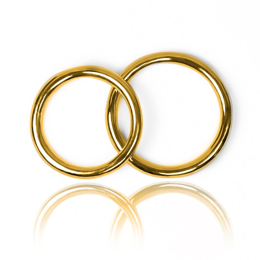 Argollas de matrimonio sin fin tubulares fabricadas en oro 18k de Joyería Caracas, cada una cuenta con certificado de calidad, garantizando una pieza duradera y de alta calidad.