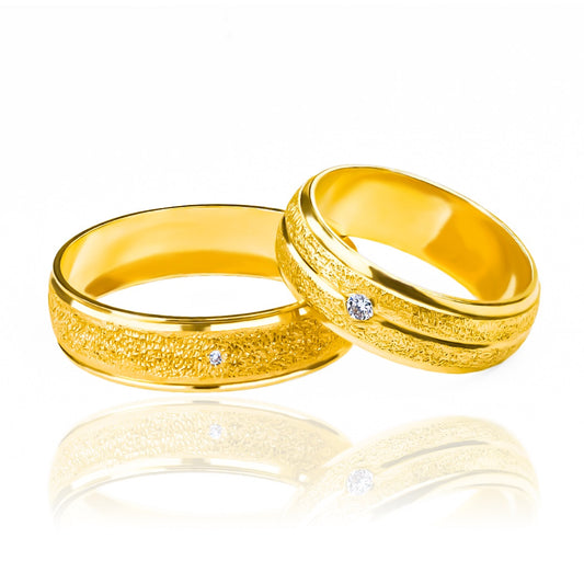 Argollas de matrimonio Street Love, fabricadas en oro 18k por Joyería Caracas, cuentan con certificado de calidad y garantía para toda la vida.