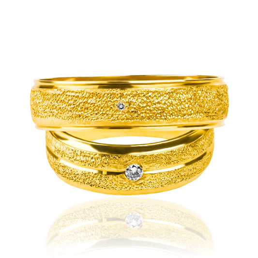 Argollas de matrimonio Street Love, fabricadas en oro 18k por Joyería Caracas, cuentan con certificado de calidad y garantía para toda la vida.