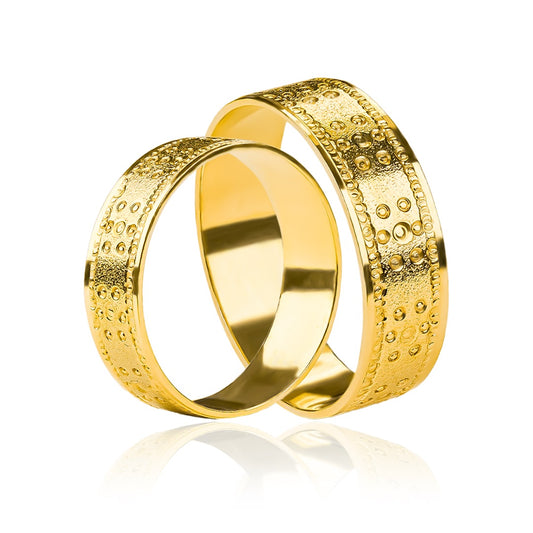 Argollas de matrimonio Sun & Flower, elaboradas en oro 18k por Joyería Caracas, cuentan con un certificado de calidad y garantía de por vida.