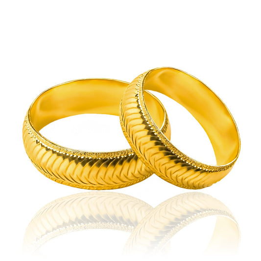 Argollas de matrimonio Thorn M, elaboradas en oro 18k por Joyería Caracas, cada argolla cuenta con un certificado de calidad y una garantía de por vida.