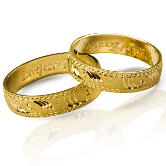 Argollas de matrimonio Tiger Cóncava, fabricadas en oro 18k por Joyería Caracas, vienen con certificado de calidad y garantía de por vida.