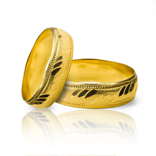 Argollas de matrimonio Tiger Media Caña, elaboradas en oro 18k por Joyería Caracas, cada una cuenta con certificado de calidad y garantía de por vida.