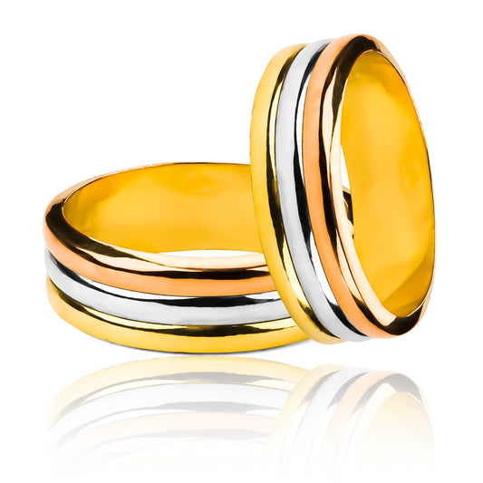 Argollas de matrimonio Trik 3 Oros, elaboradas en oro 18k por Joyería Caracas, cuenta con certificado de calidad y garantía de por vida.