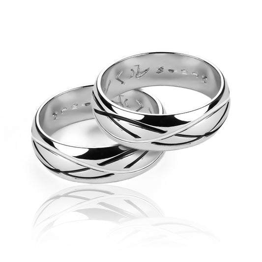 Argollas de matrimonio Yin Yang, elaboradas en oro 18k por Joyería Caracas, cuenta con certificado de calidad y garantía de por vida.