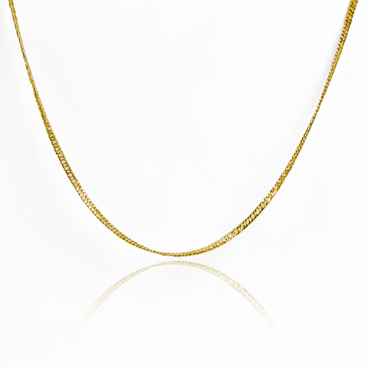 Cadena Mini Cubana super E50. Hecha con oro 18k en Joyería Caracas, esta cadena te ofrece una garantía de por vida.