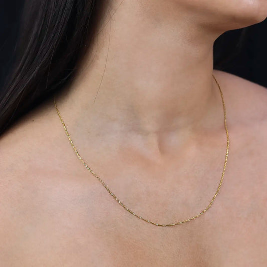 Cuello de mujer con cadena en tejido singapur de 50cm en oro amarillo de 18 quilates, hecho en Joyería Caracas.