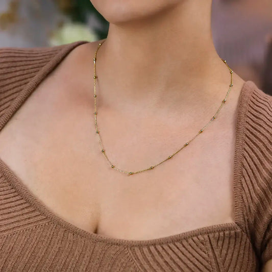 Cuello de mujer con cadena en tejido special sphere en oro amarillo de 18 quilates, hecho en Joyería Caracas.