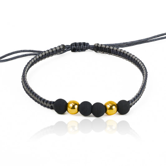 Pulsera Esfera Lisa #6 x 2 de Joyería Caracas está elaborada en oro 18k, con detalles en hilo coreano y bisutería de calidad. Con garantía de por vida y sin costo adicional.