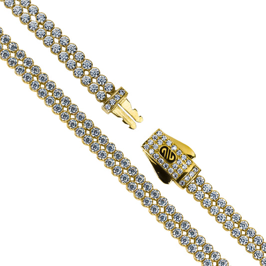 Pulsera Monaco cristales dobles fabricada en oro 18K por Joyería Caracas. Además, cuenta con garantía para toda la vida, asegurando su calidad y durabilidad.