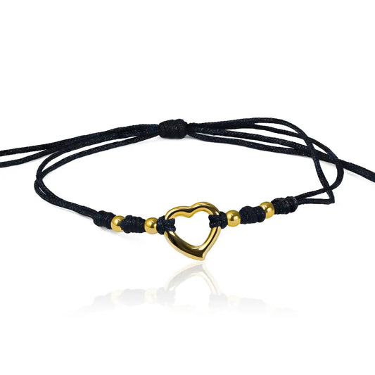 Pulsera Corazón + Esferas #3 de Joyería Caracas está elaborada en oro 18k, con detalles de hilo coreano y bisutería de calidad. Con garantía de por vida.