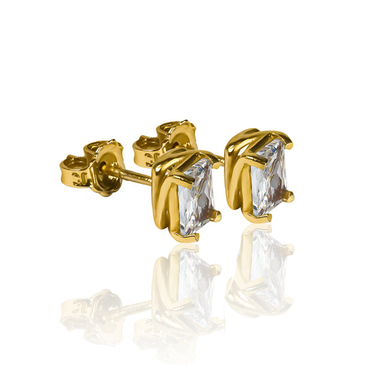 Topitos Silent Spin Baguette II, fabricado en oro 18 quilates por Joyería Caracas, cuenta con una garantía para toda la vida.