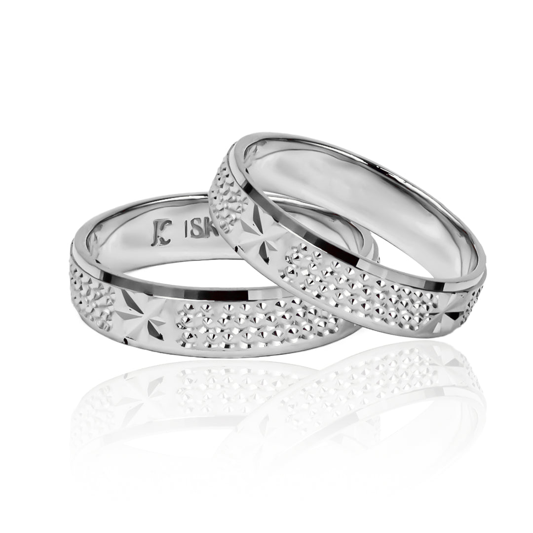 Argollas de matrimonio Starry Sky de Joyería Caracas, fabricadas en oro de 18K, cuentan con garantían de por vida.