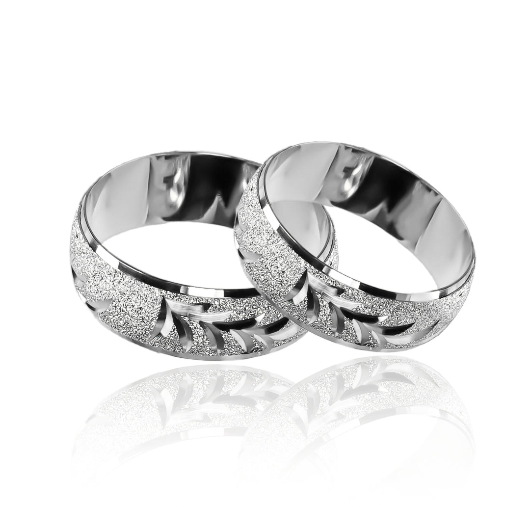 Argollas de matrimonio Twigs. Fabricadas en oro de 18K por Joyería Caracas. Cuenta con garantía de por vida.