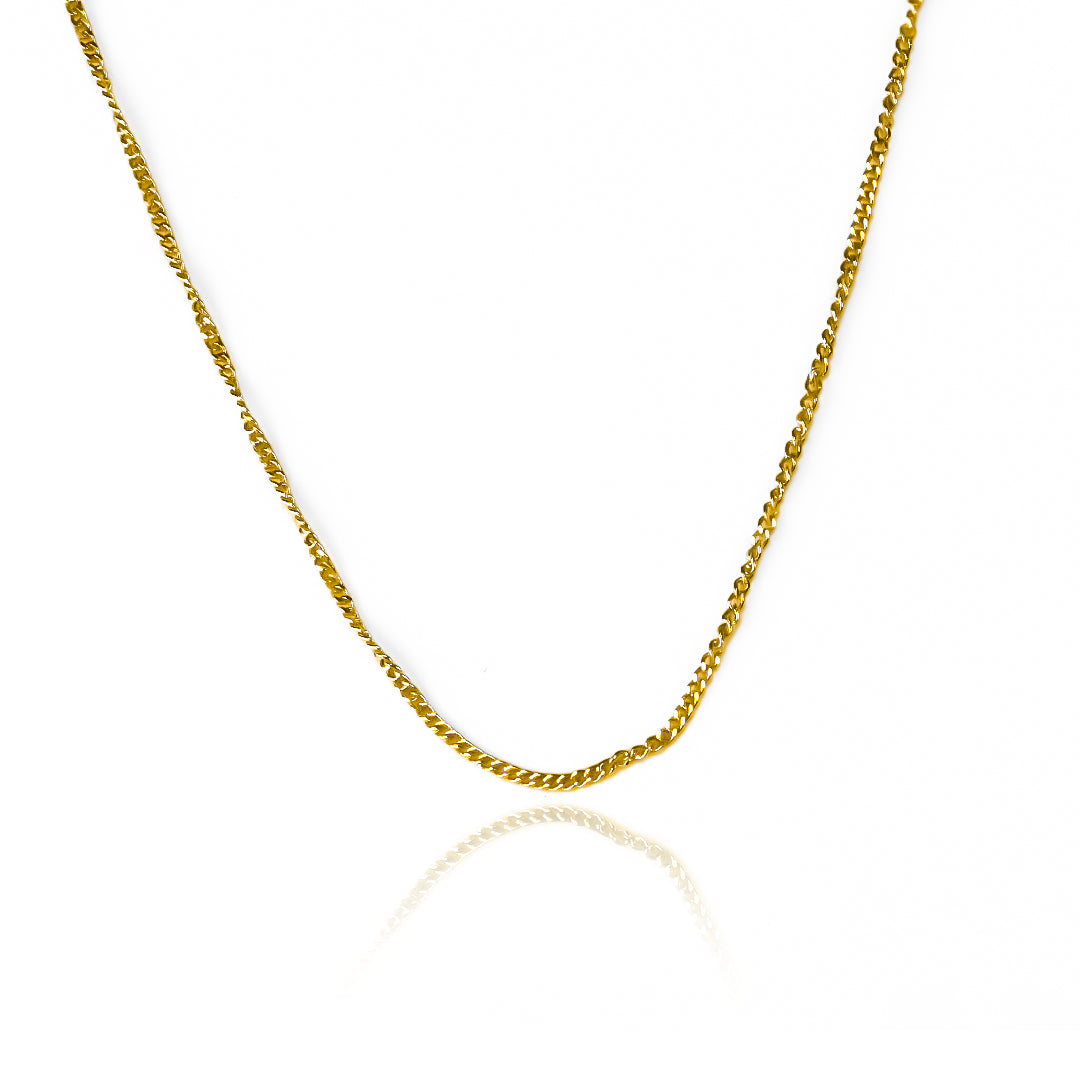 Cadena Mini Cubana fabricada en oro 18k por Joyería Caracas, cuenta con una garantía de por vida.