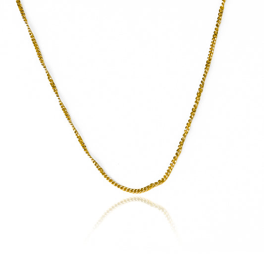 Cadena Mini Cubana fabricada en oro 18k por Joyería Caracas, cuenta con una garantía de por vida.
