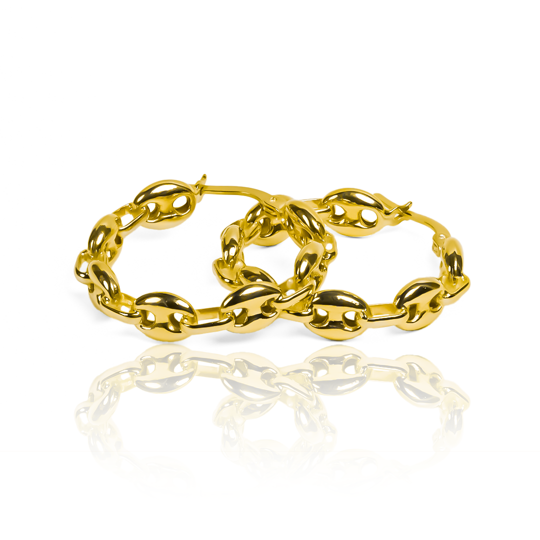 Descubra la elegancia y exclusividad de Candongas Calabrote MI. Confeccionado en oro 18K por Joyería Caracas, cada pieza es una obra de arte. Con garantía para toda la vida, su belleza durará por siempre. Deje que Candongas Calabrote MI sea el accesorio perfecto para su estilo único.