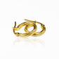 El estilo clásico de Candongas Melcocha, con su elegante diseño en oro de 18K, es perfecto para una mujer sofisticada y exclusiva. Fabricado por Joyería Caracas con una garantía para toda la vida, esta pieza es una joya atemporal que puede ser pasada de generación en generación.