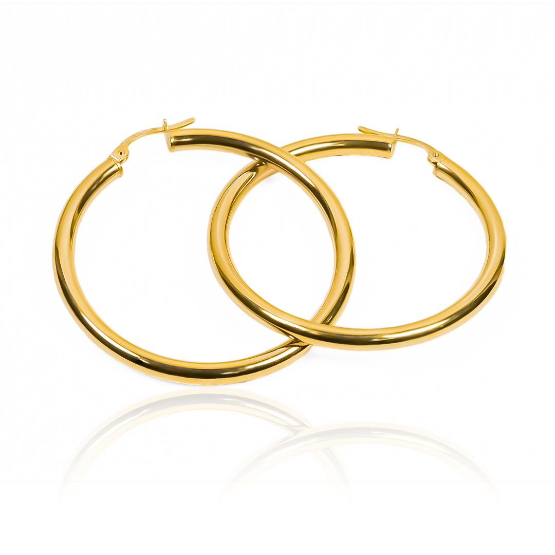 La Candongas Tubo Clásica XL I es una joya elegante y exclusiva de Oro 18K, creada por Joyería Caracas. Brinda un toque de lujo a cualquier atuendo y cuenta con una garantía de por vida, asegurando su calidad y valor a largo plazo. Haz de esta pieza un tesoro en tu colección.
