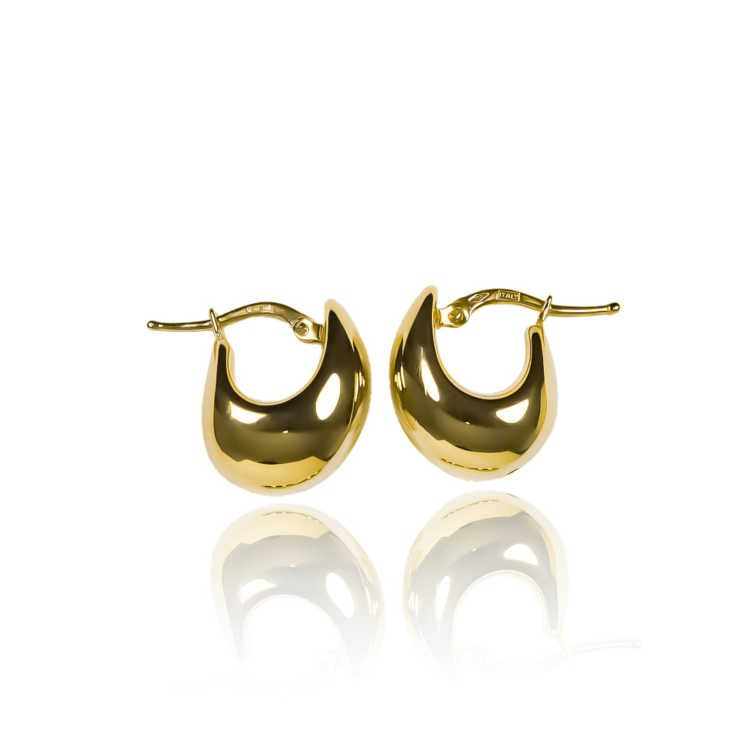 Candongas Glossy, elaboradas en oro 18K por Joyería Caracas. Con su garantía para toda la vida.