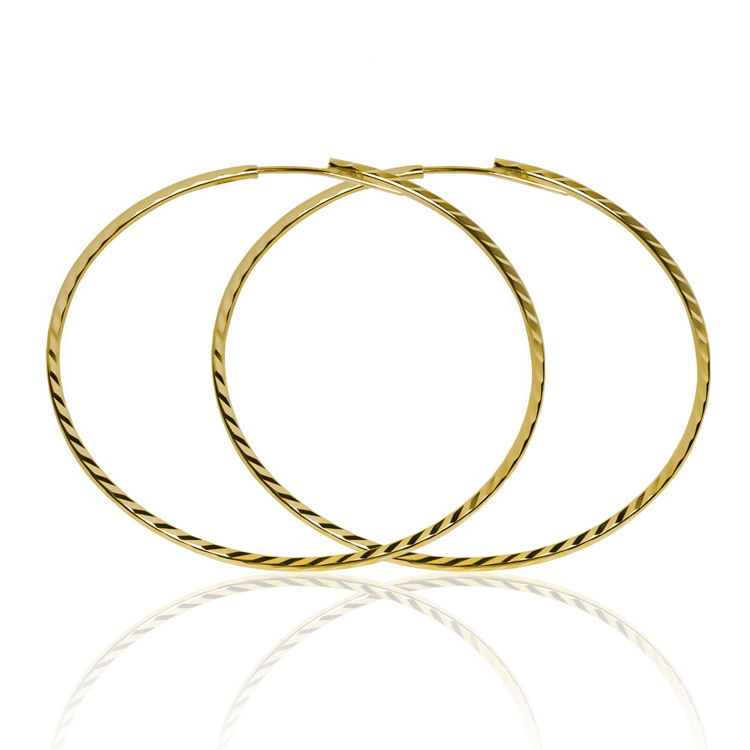 Candongas Square tube Klint XL, fabricadas en Oro 18K por Joyería Caracas, cuenta con certificado de calidad y garantía de por vida.
