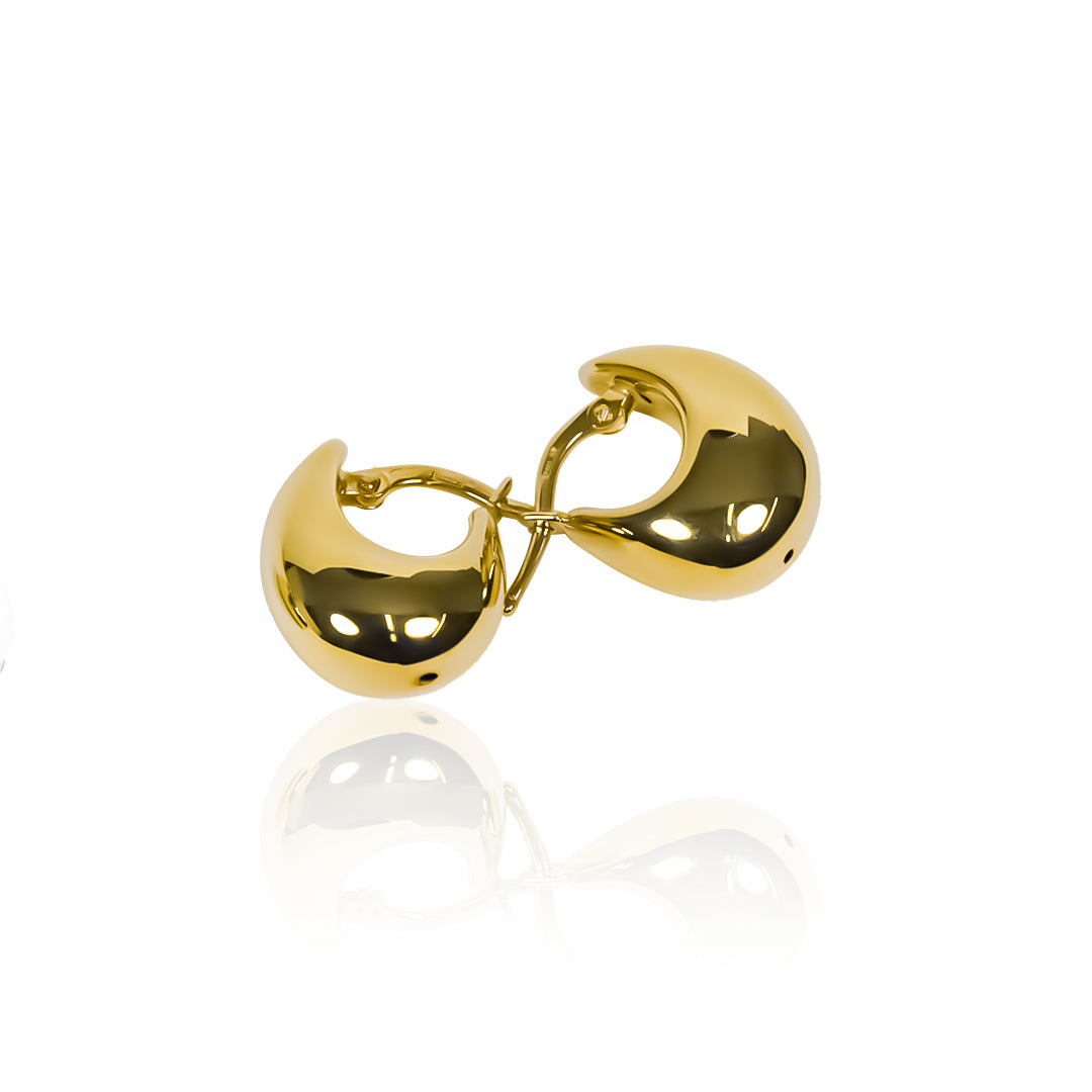 Candongas Glossy, elaboradas en oro 18K por Joyería Caracas. Con su garantía para toda la vida.