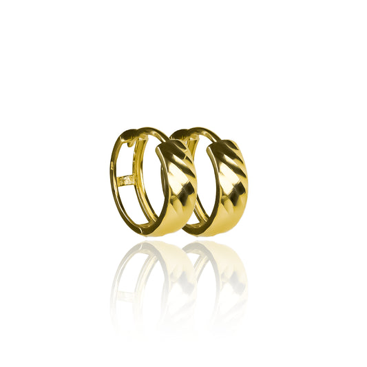 Candongas diamantadas ímpetu, elaboradas en oro de 18K por Joyería Caracas. Con garantía para toda la vida.