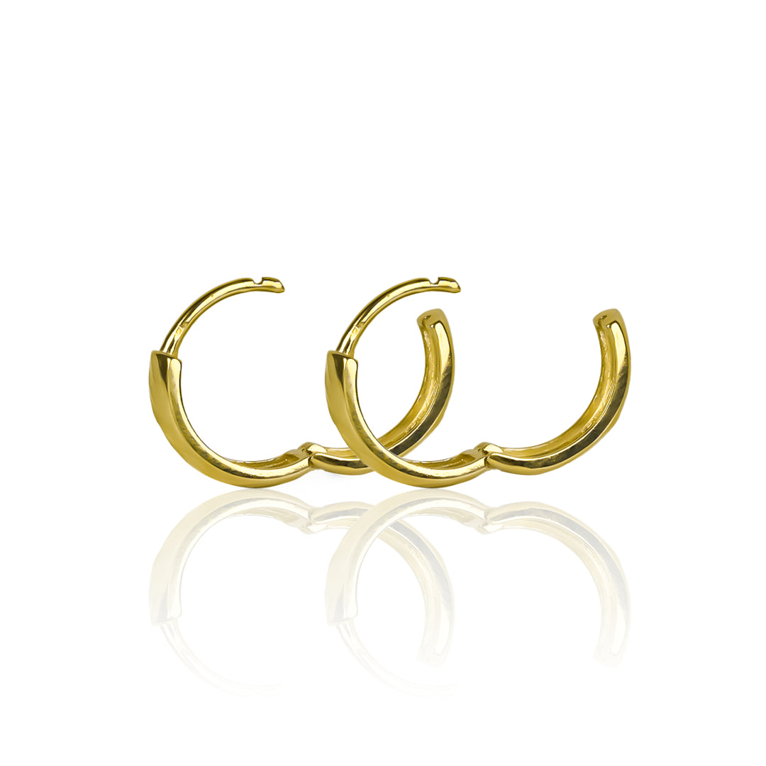 Candongas diamantadas ímpetu, elaboradas en oro de 18K por Joyería Caracas. Con garantía para toda la vida.