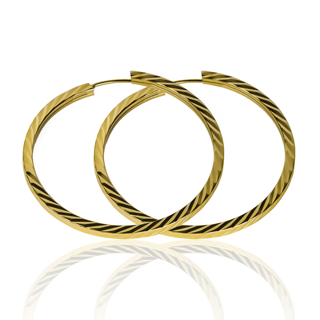 Candongas Square tube Klint L, fabricada en Oro 18K por Joyería Caracas, cuenta con certificado de calidad y garantía de por vida.
