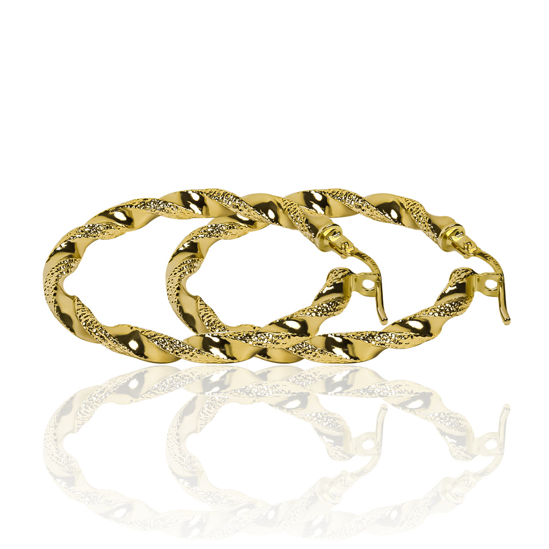 Candongas melcocha Rivel M de Joyería Caracas, elaboradas en Oro 18K, su garantía de por vida asegura una joya duradera y de alta calidad.