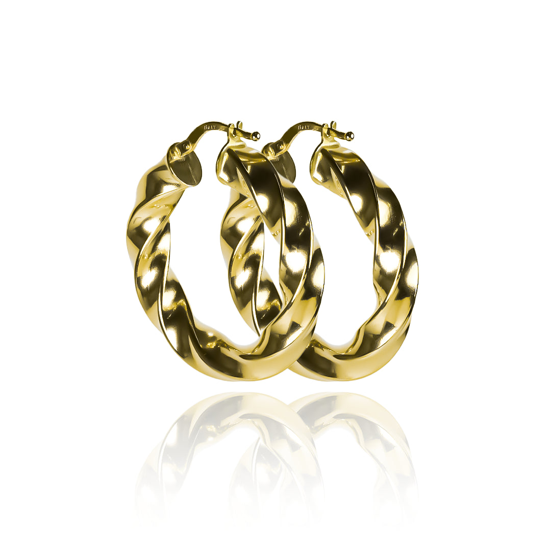 Candongas melcocha Spira L fabricadas en oro 18k por Joyería Caracas, cuenta con una garantía para toda la vida.