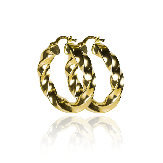 Candongas melcocha Spira L fabricadas en oro 18k por Joyería Caracas, cuenta con una garantía para toda la vida.