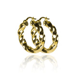 Candongas melcocha Spira L fabricadas en oro 18k por Joyería Caracas, cuenta con una garantía para toda la vida.