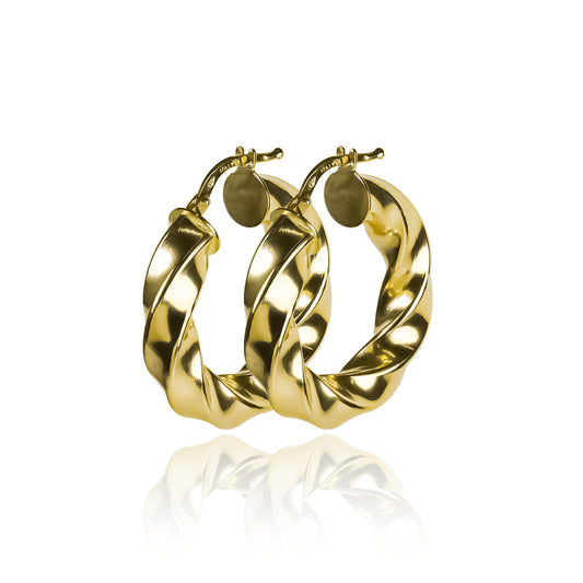Candongas melcocha Spira M fabricadas en oro 18k por Joyería Caracas, cuenta con una garantía para toda la vida.