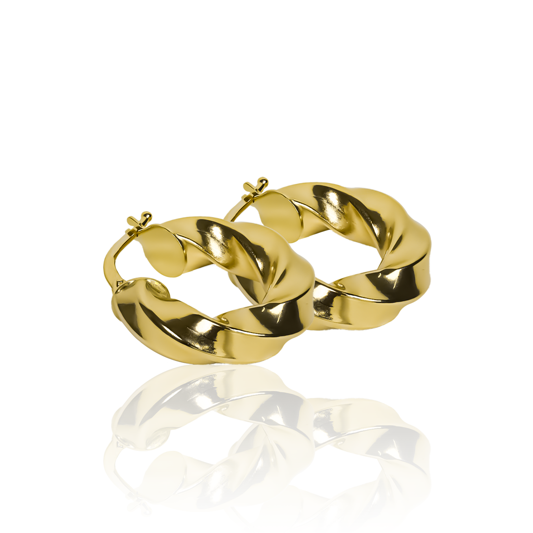 Candongas melcocha melcocha Spira S. Fabricada en Joyería Caracas, elaboradas en oro de 18K y cuenta con una garantía para toda la vida.