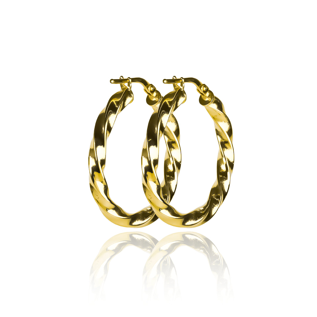Candongas melcocha twiste M fabricadas en oro 18k por Joyería Caracas, cuenta con una garantía para toda la vida.