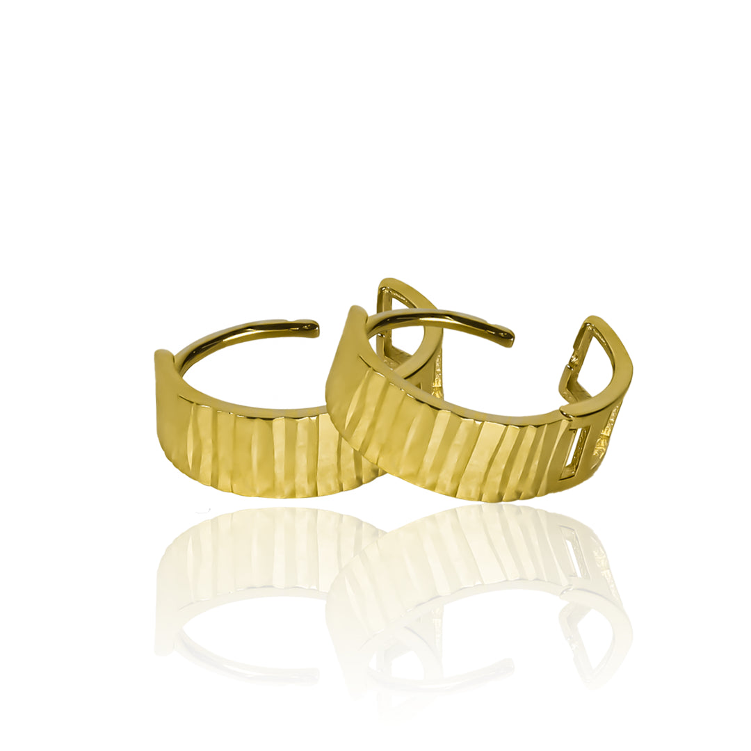 Candongas diamantadas kiva, elaboradas en oro de 18K en Joyería Caracas. Con garantía para toda la vida.