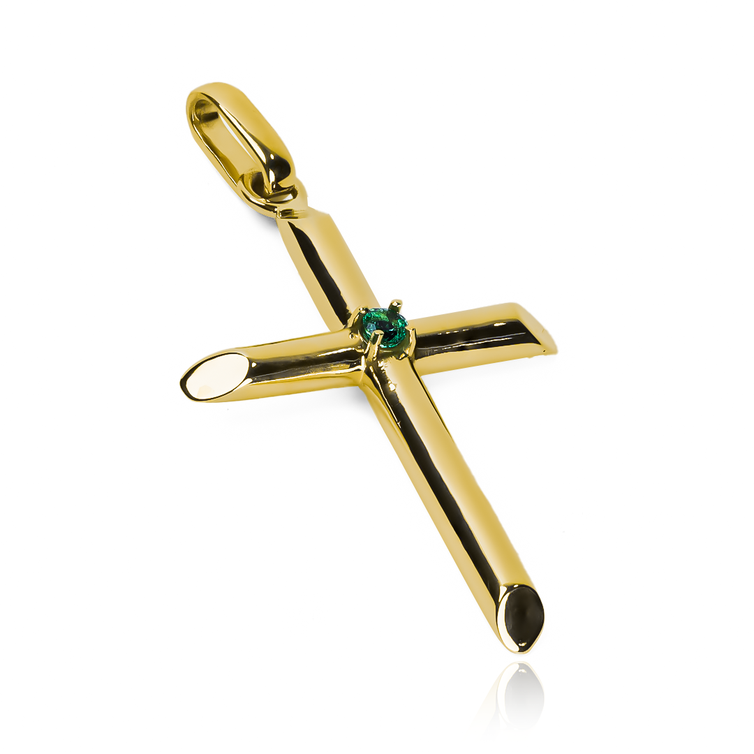 Dije Cruz Centro esmeralda. Hecha de Oro 18K y diseñada por la prestigiosa Joyería Caracas, cuenta con garantía de por vida. 