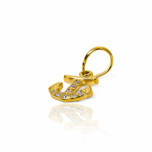 Dije Anchor S JT. Realizado en Oro 18K y con el respaldo de Joyería Caracas, esta pieza te brinda una garantía de por vida.