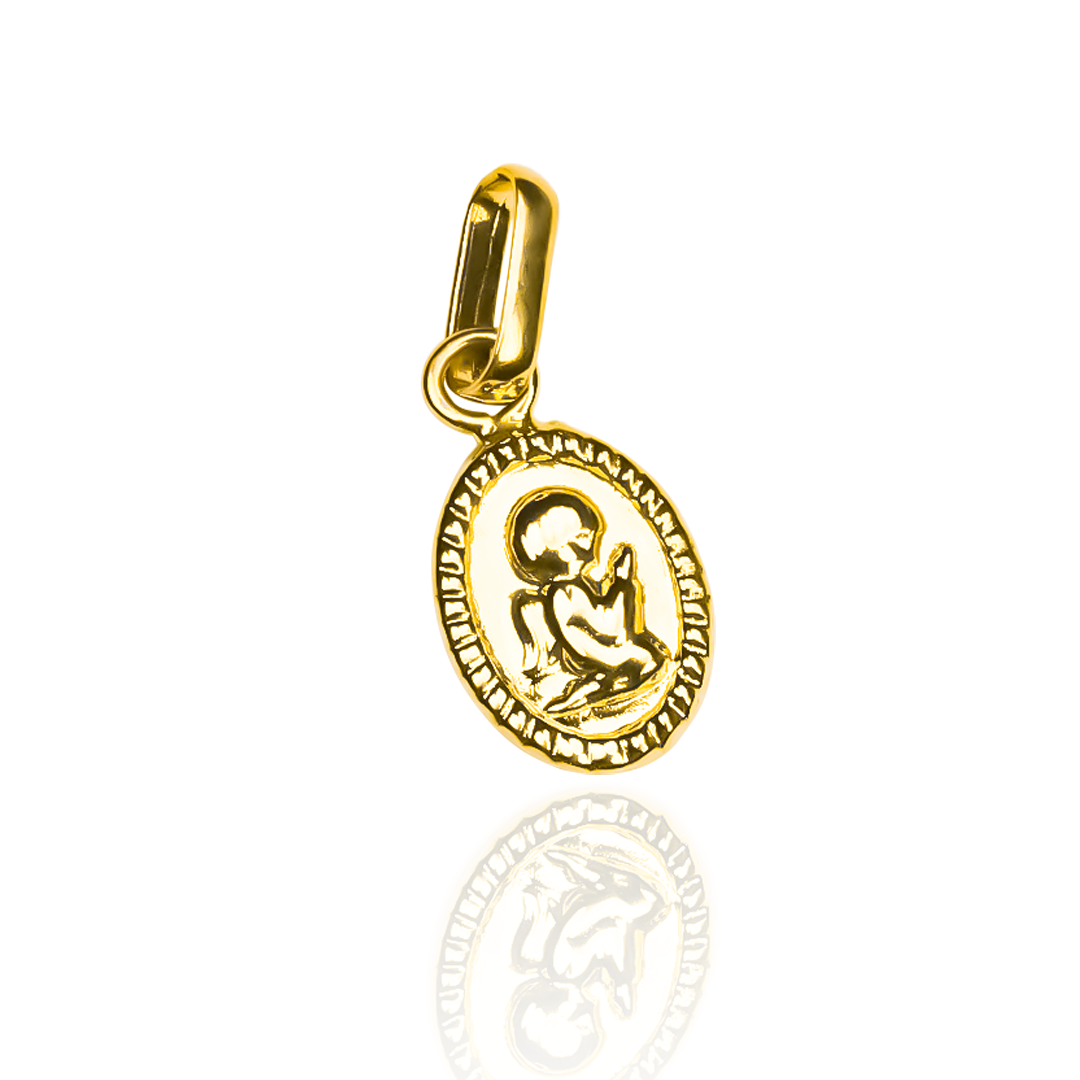Dije Angelito rezando de oro 18K. De la exclusiva Joyería Caracas, esta pieza de alta calidad viene con garantía para toda la vida.
