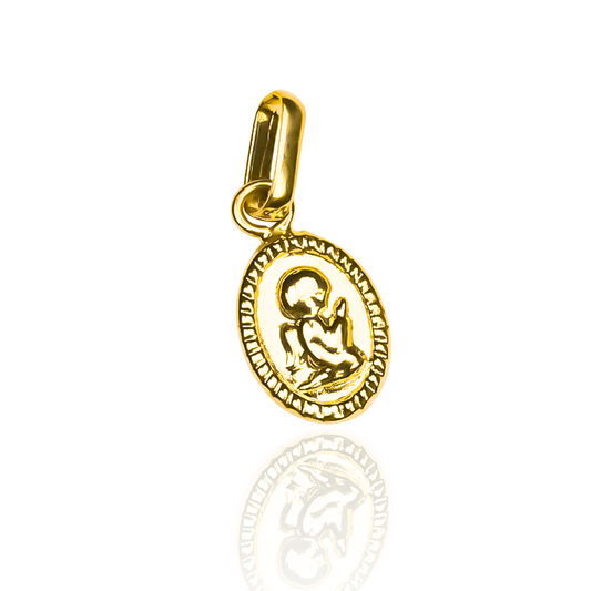 Dije Angelito rezando de oro 18K. De la exclusiva Joyería Caracas, esta pieza de alta calidad viene con garantía para toda la vida.
