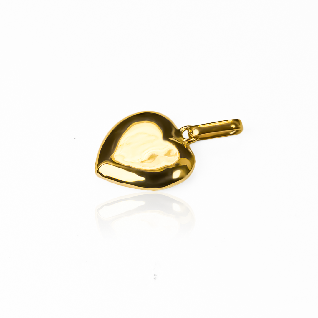 Dije Corazón Soplado L JT es una joya única y exclusiva con una cubierta de oro 18K, fabricado en Joyería Caracas, cuenta con garantía de por vida. 