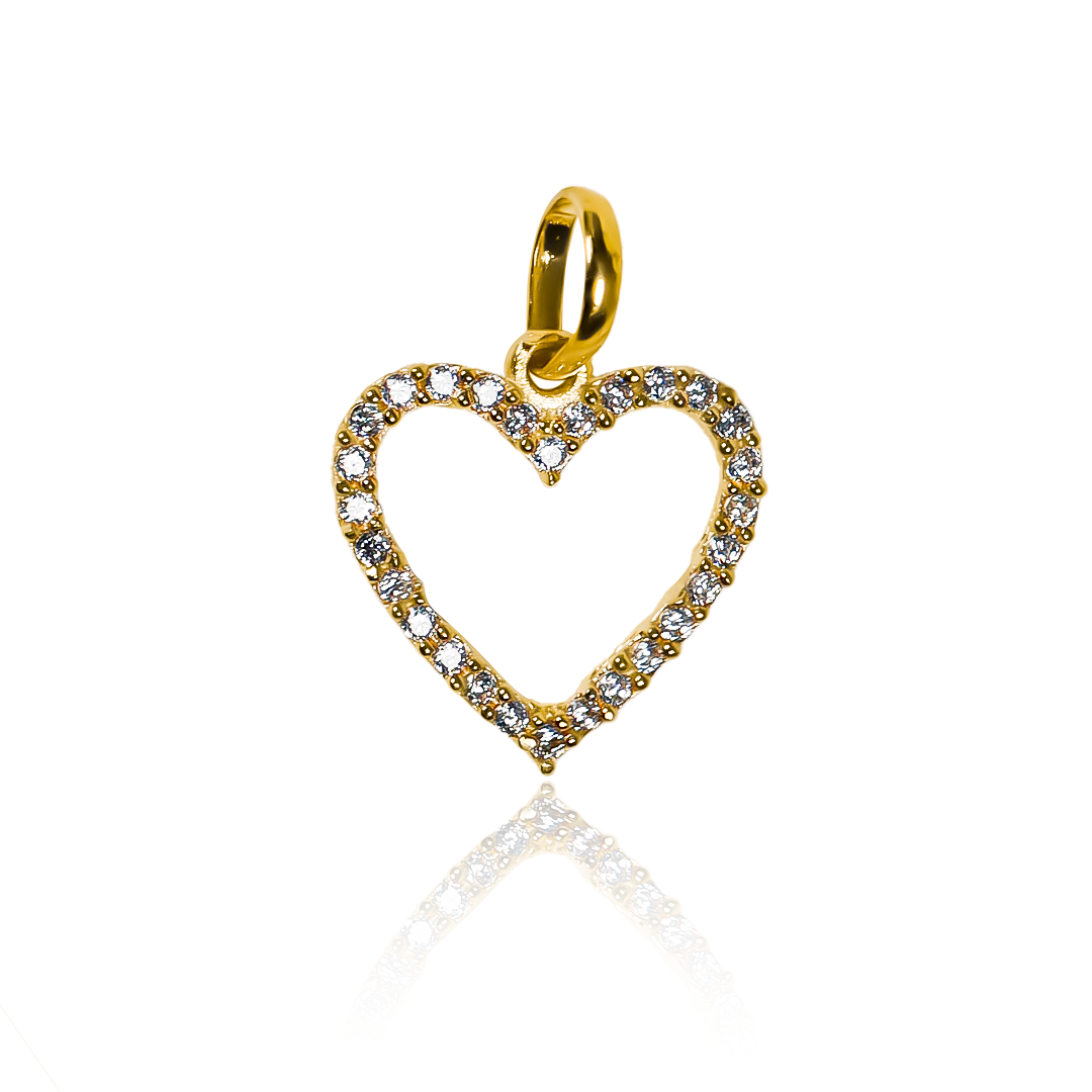 Dije Corazón con cristales M -JT. Hecho con Oro 18K de la prestigiosa Joyería Caracas, cuenta con garantía de por vida. 