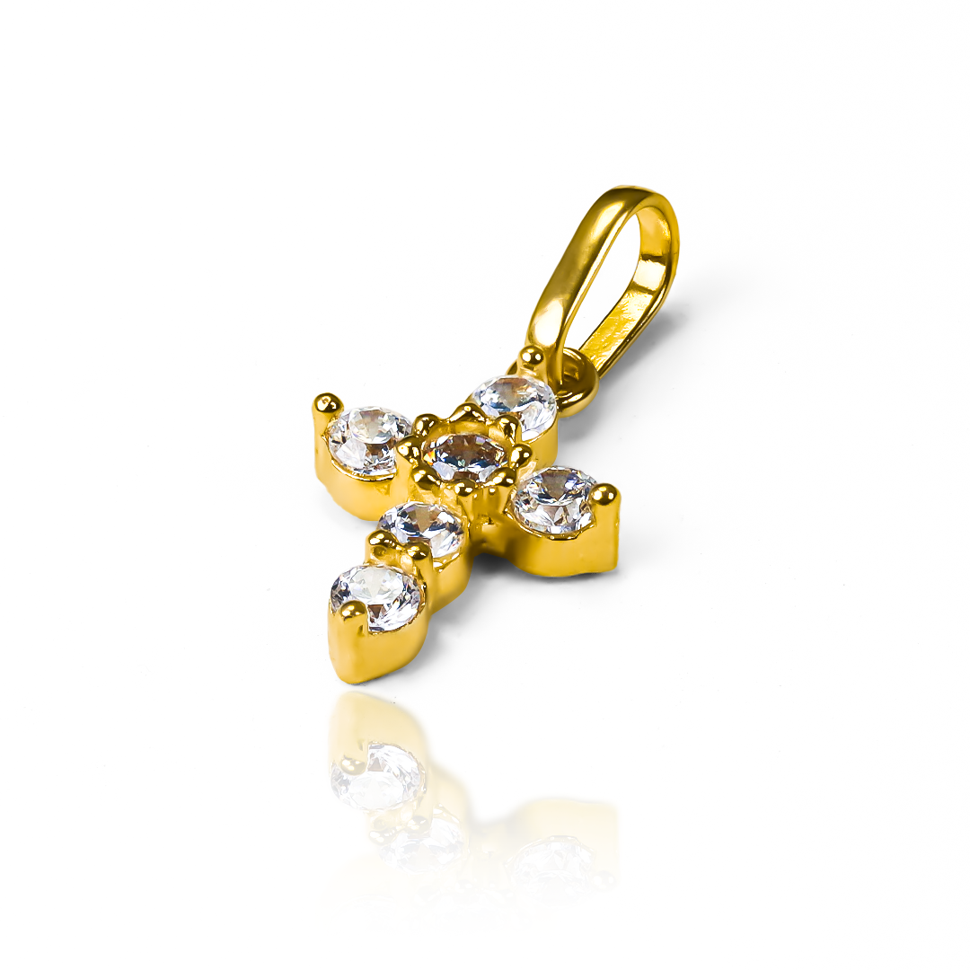 Dije Cruz SM cristales JT está elaborado en oro 18K de Joyería Caracas y cuenta con una garantía para toda la vida.