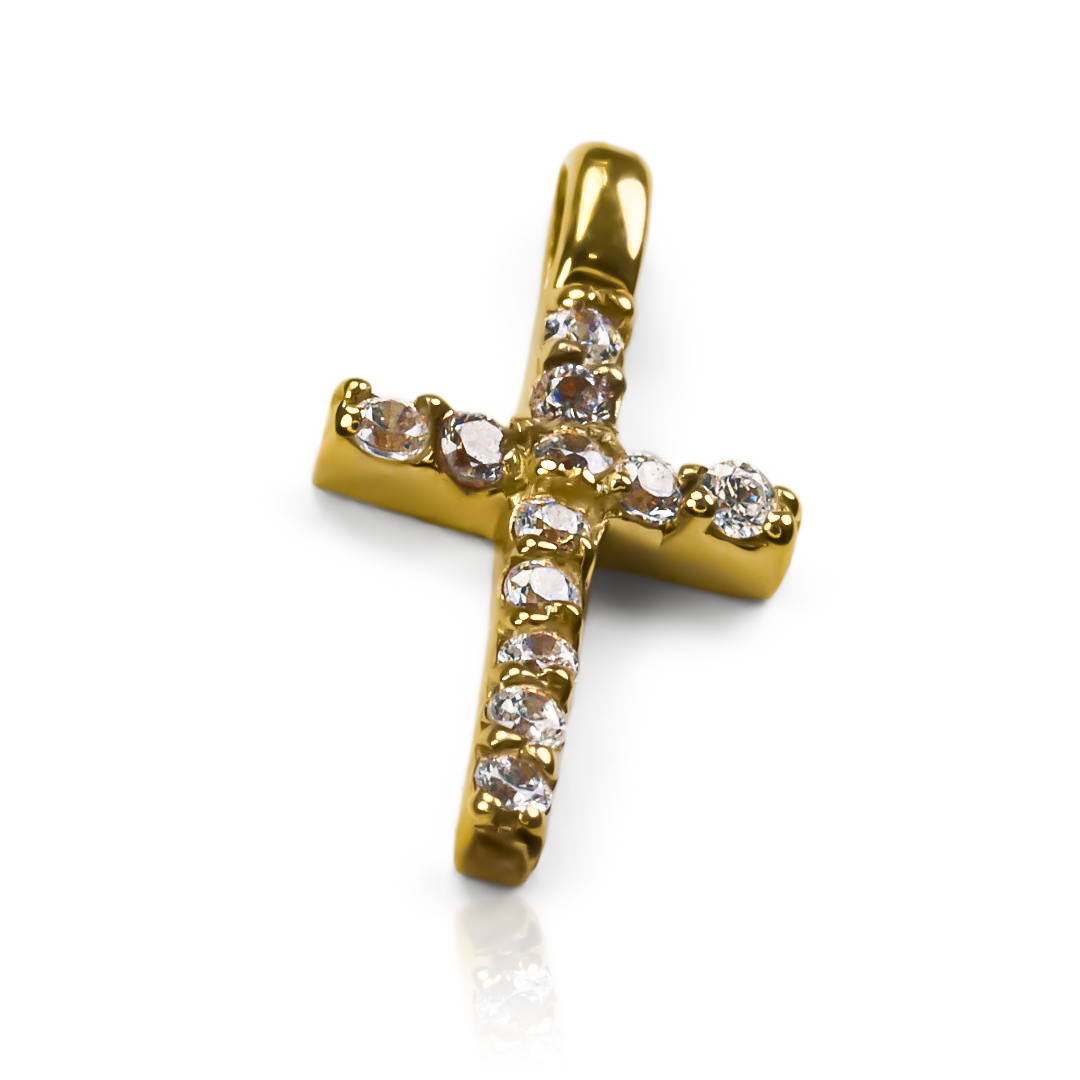 Dije Cruz cristal S F es una impresionante pieza de joyería de Joyería Caracas con un toque de lujo en oro 18K, viene con una exclusiva garantía de por vida.