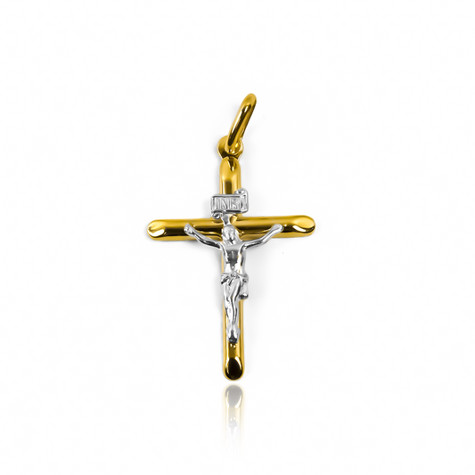 Dije Cruz cristo S medio tubo bicolor I. Hecho de Oro 18K por Joyería Caracas, cuenta con garantía de por vida. 