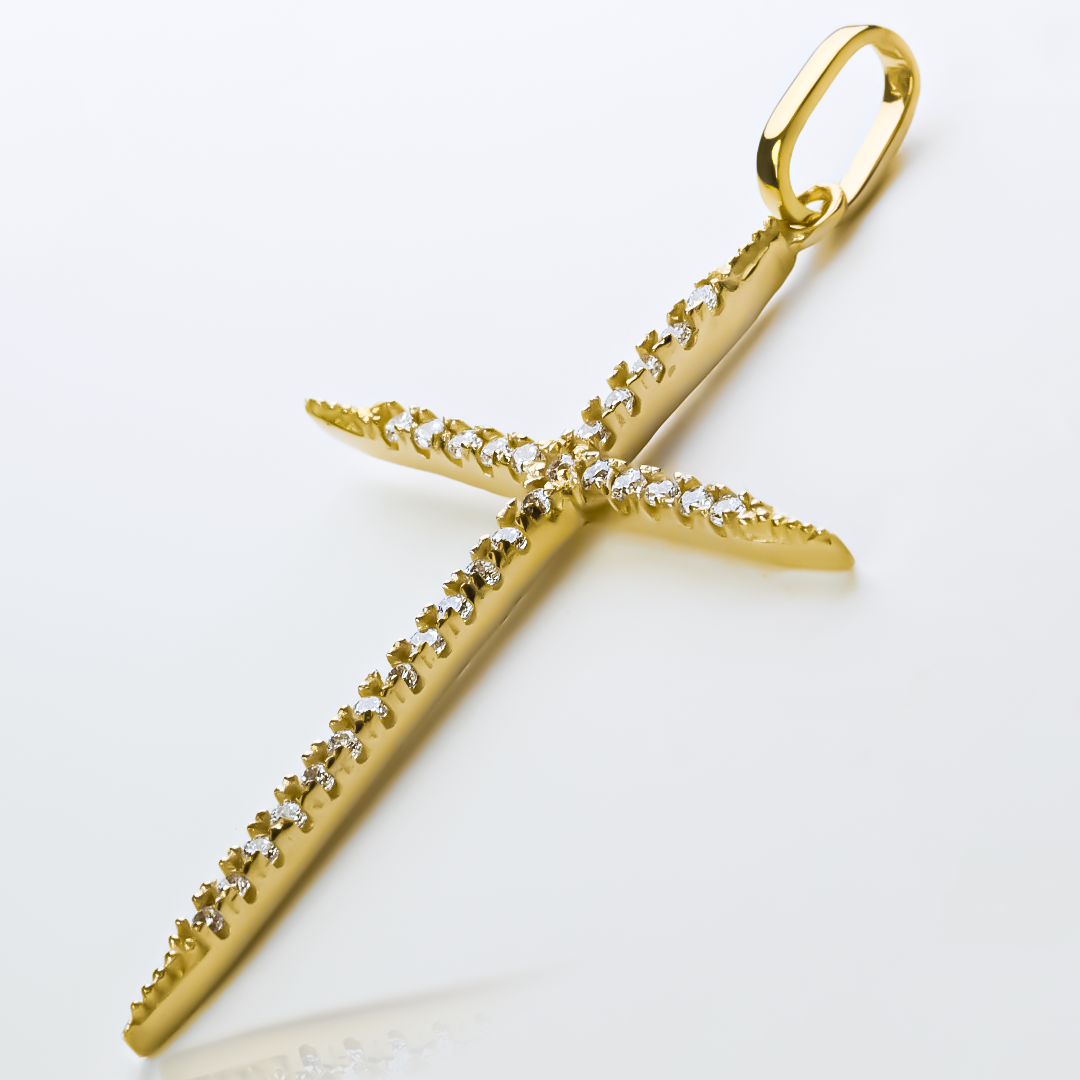 Dije Cruz de cristales J L. Hecho de Oro 18K por Joyería Caracas, asegurando calidad y durabilidad. Con garantía de por vida.