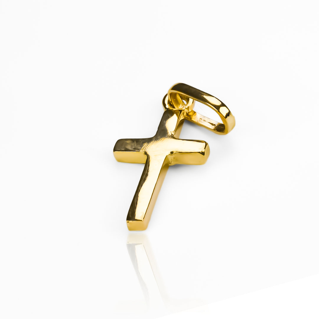 Dije de Cruz lisa están elaborados en oro 18K de la prestigiosa Joyería Caracas. Con garantía para toda la vida.